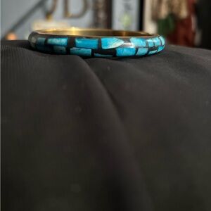 Vintage brass bangle bracelet with brass interior with turquoise inlay India